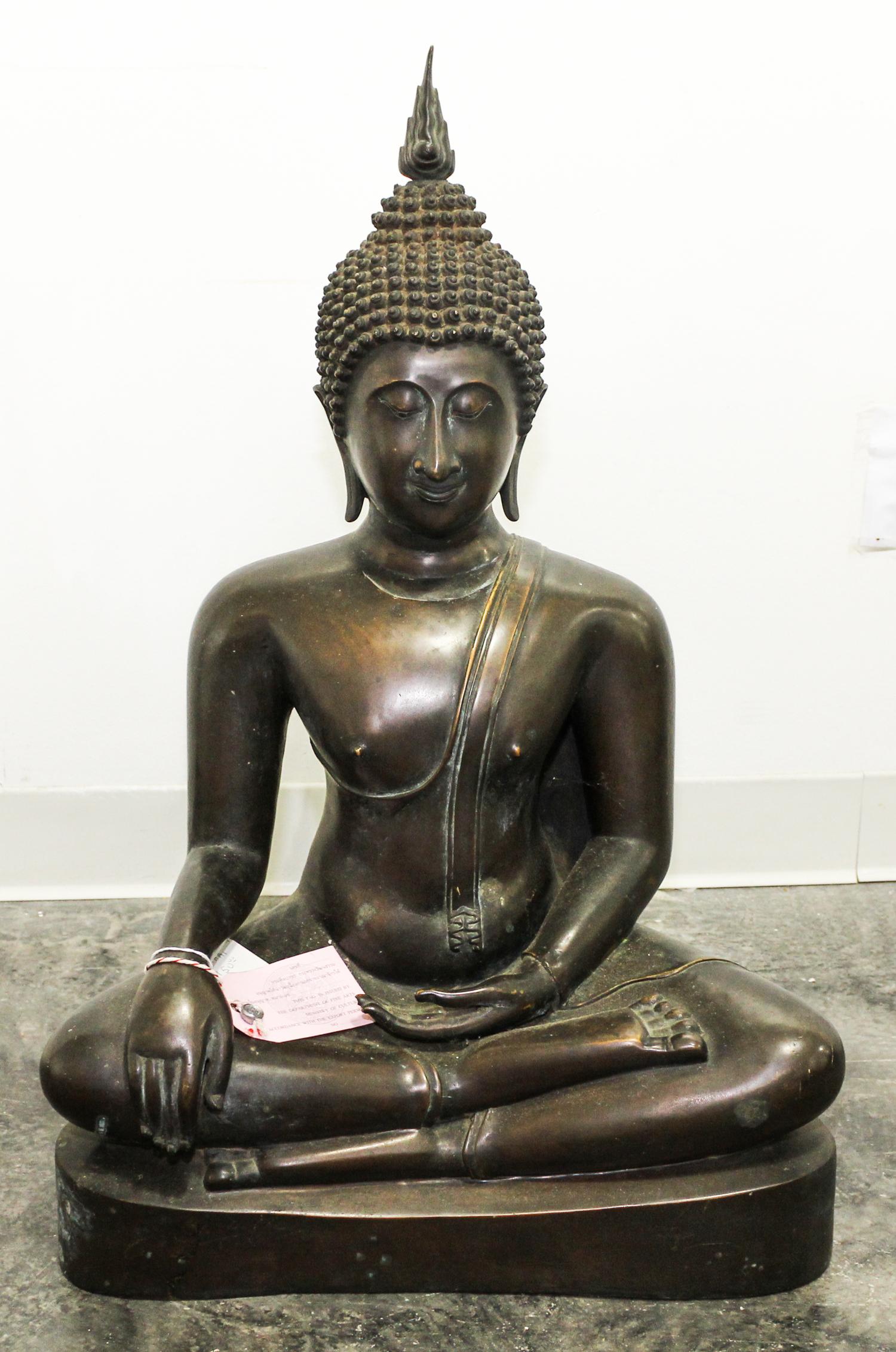 A Bronze Seated Buddha. Height 28 inches.