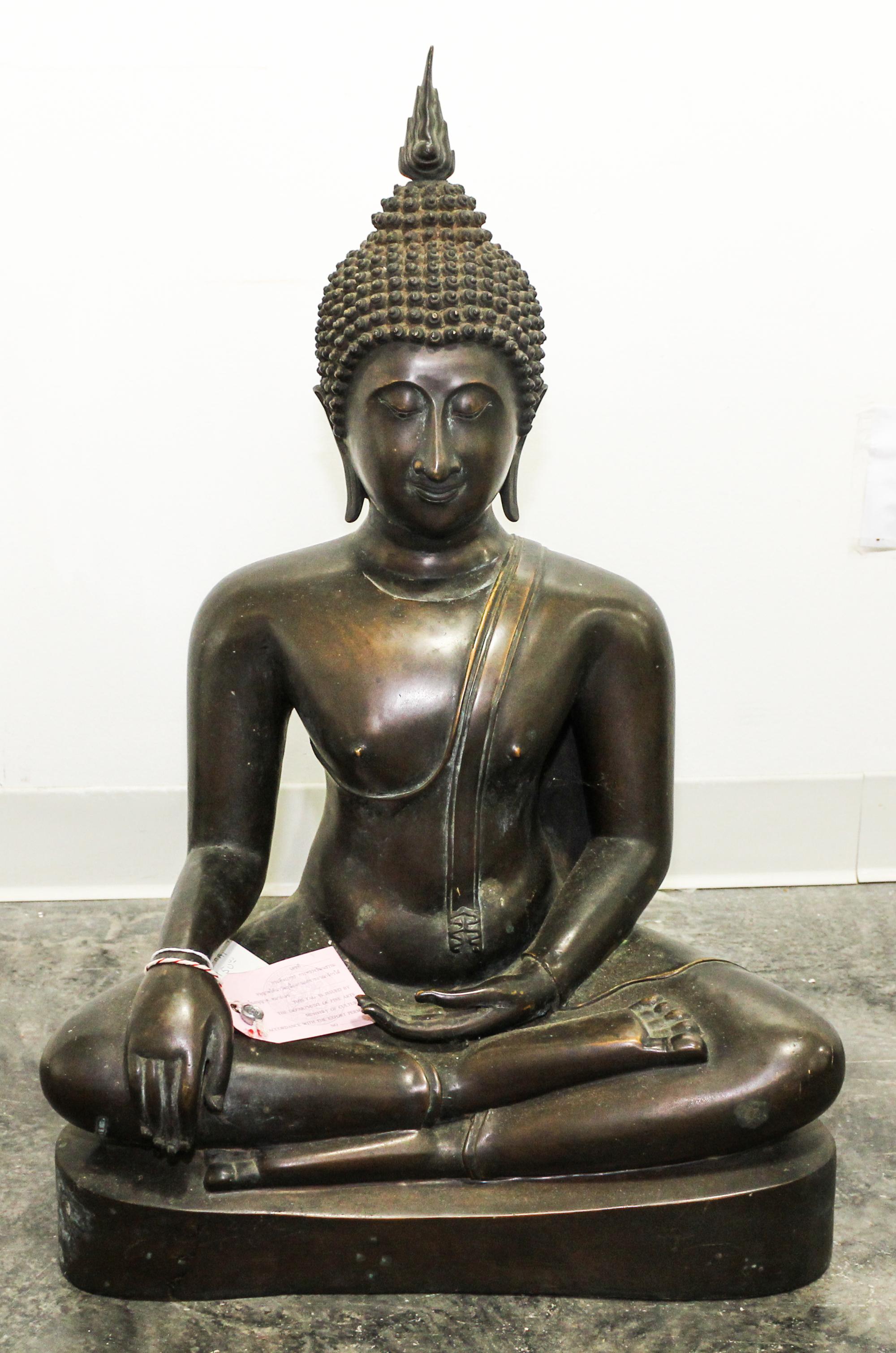 A Bronze Seated Buddha. Height 28 inches.