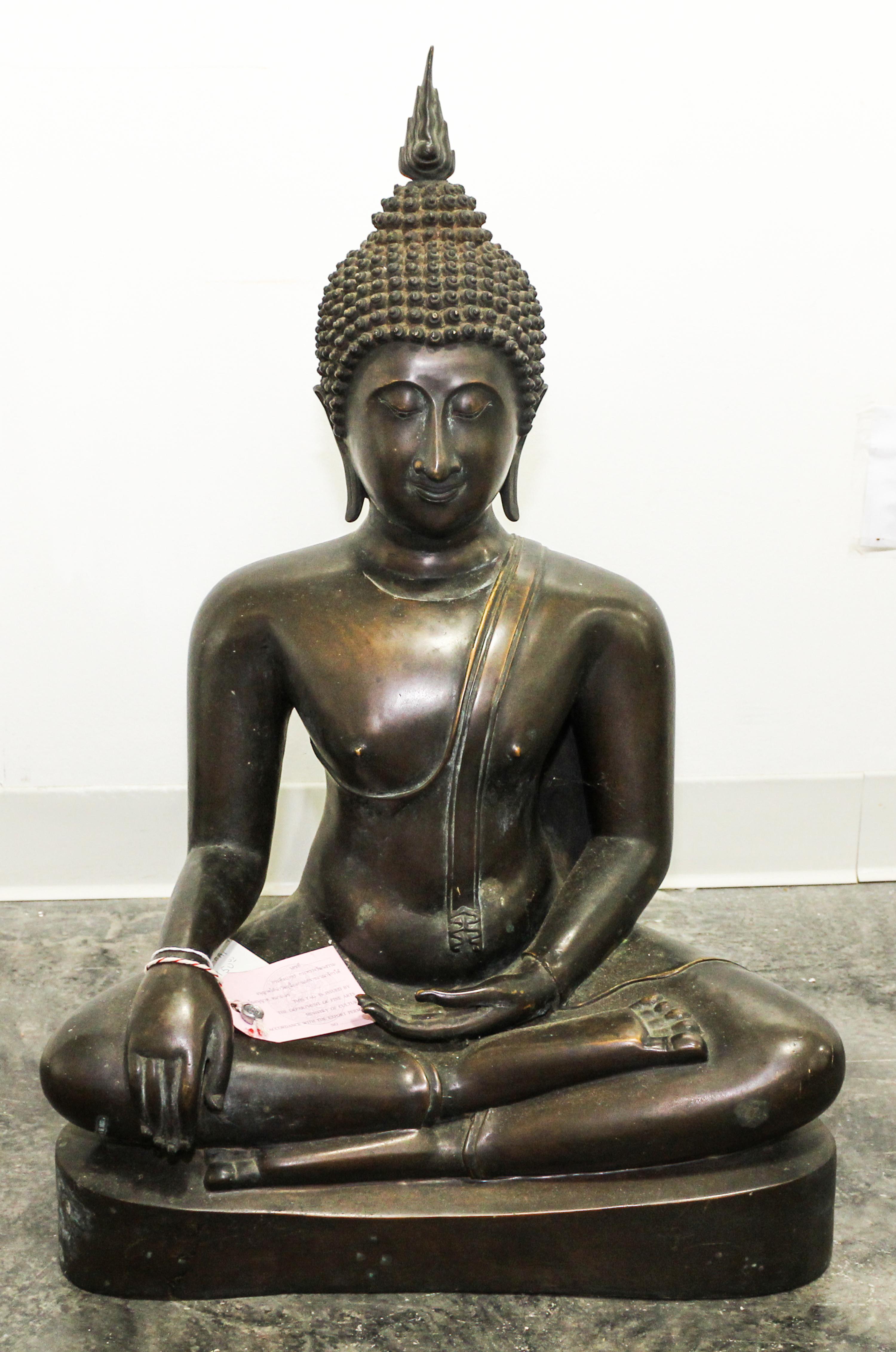 A Bronze Seated Buddha. Height 28 inches.