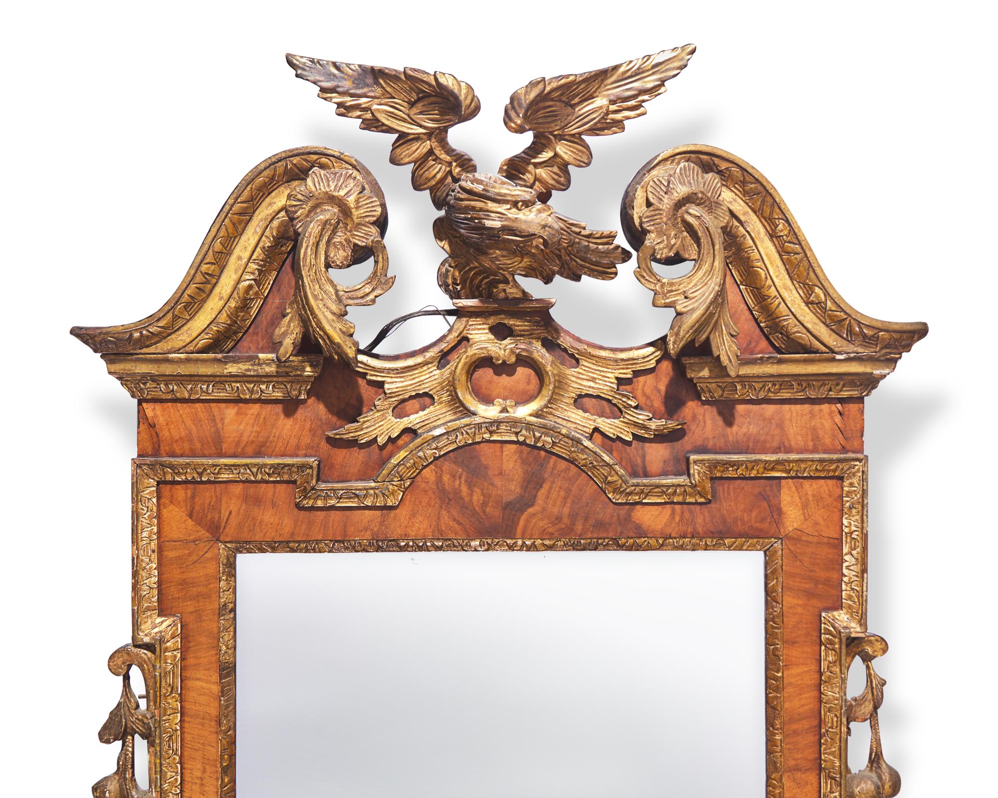 A Large Chippendale Parcel-Gilt And Mahogany-Veneered Looking Glass