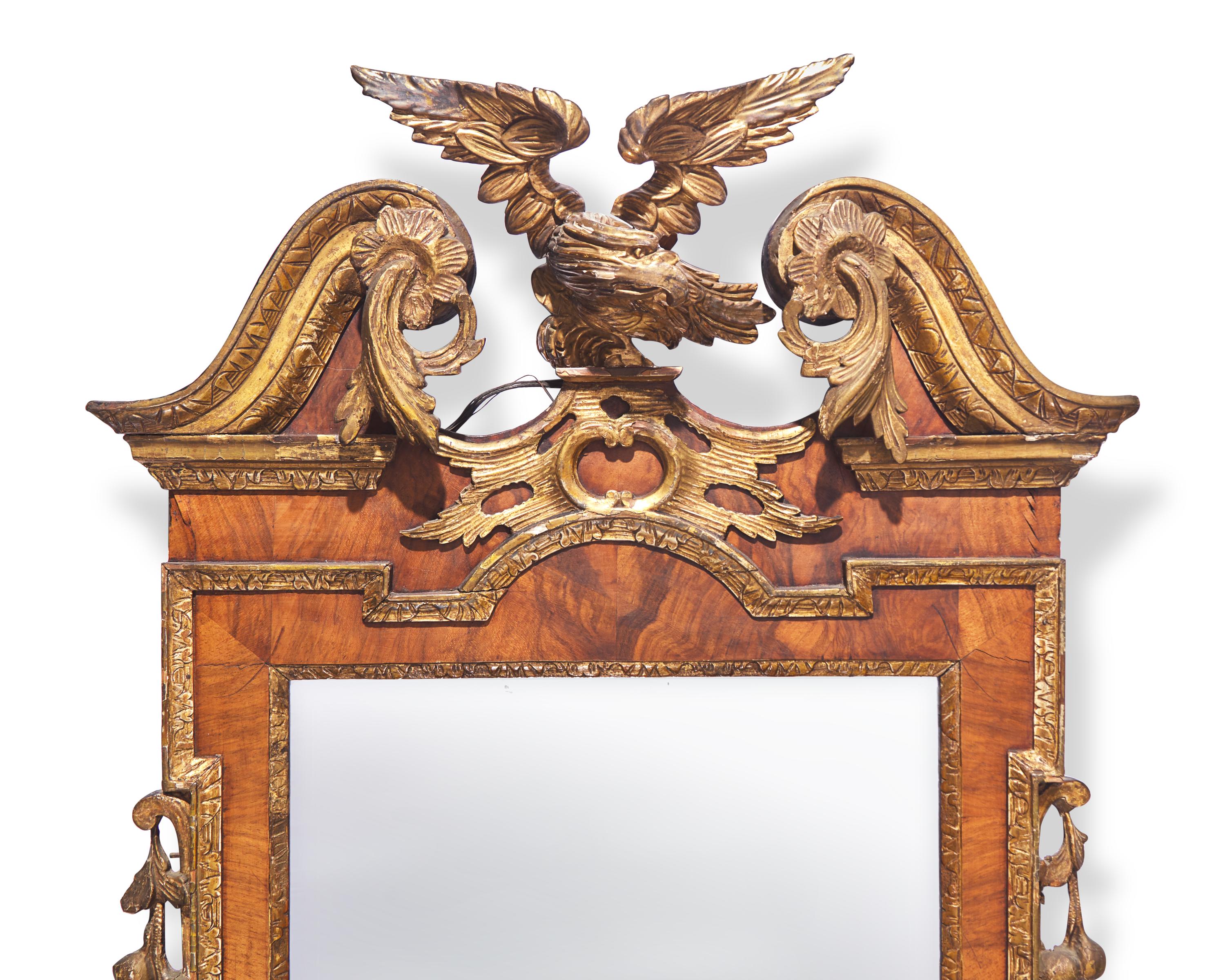 A Large Chippendale Parcel-Gilt And Mahogany-Veneered Looking Glass