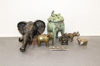 A Group of Seven Ethnographic Elephant Figures Height of tallest 15 inches.