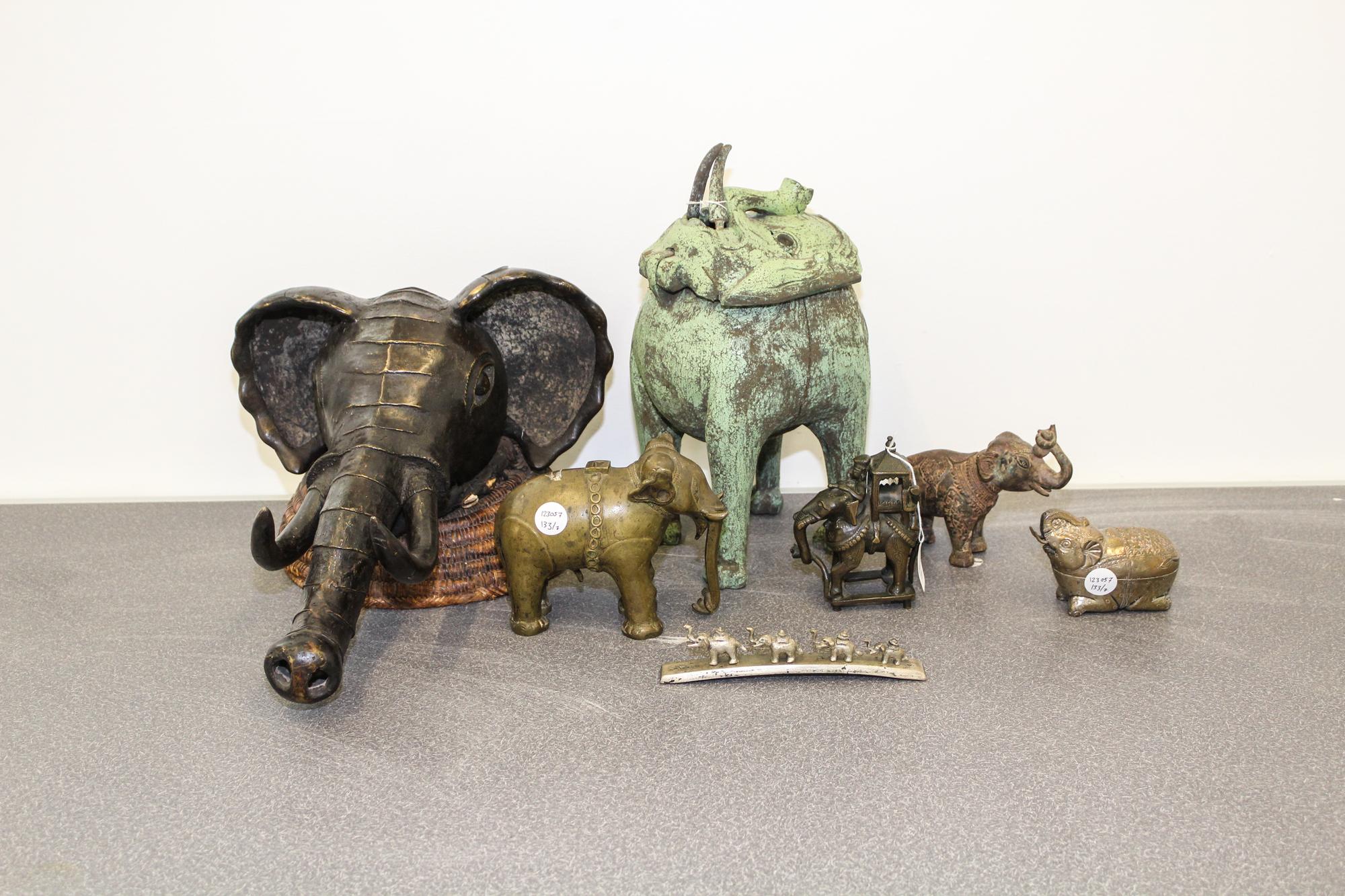 A Group of Seven Ethnographic Elephant Figures Height of tallest 15 inches.