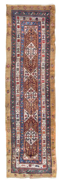 A Caucasian Wool Runner 11 feet 4 inches x 3 feet 8 1/2 inches.