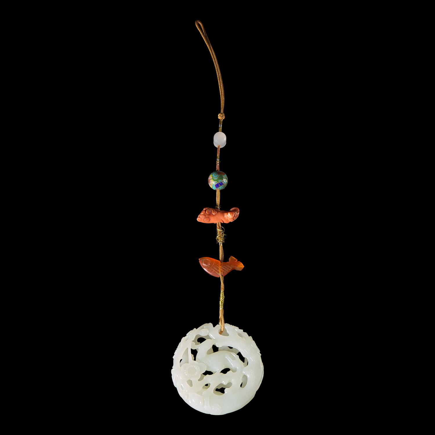 A Chinese White Jade Reticulated 'Phoenix' Pendant — 白玉鏤雕鳳鳥紋玉子岡佩