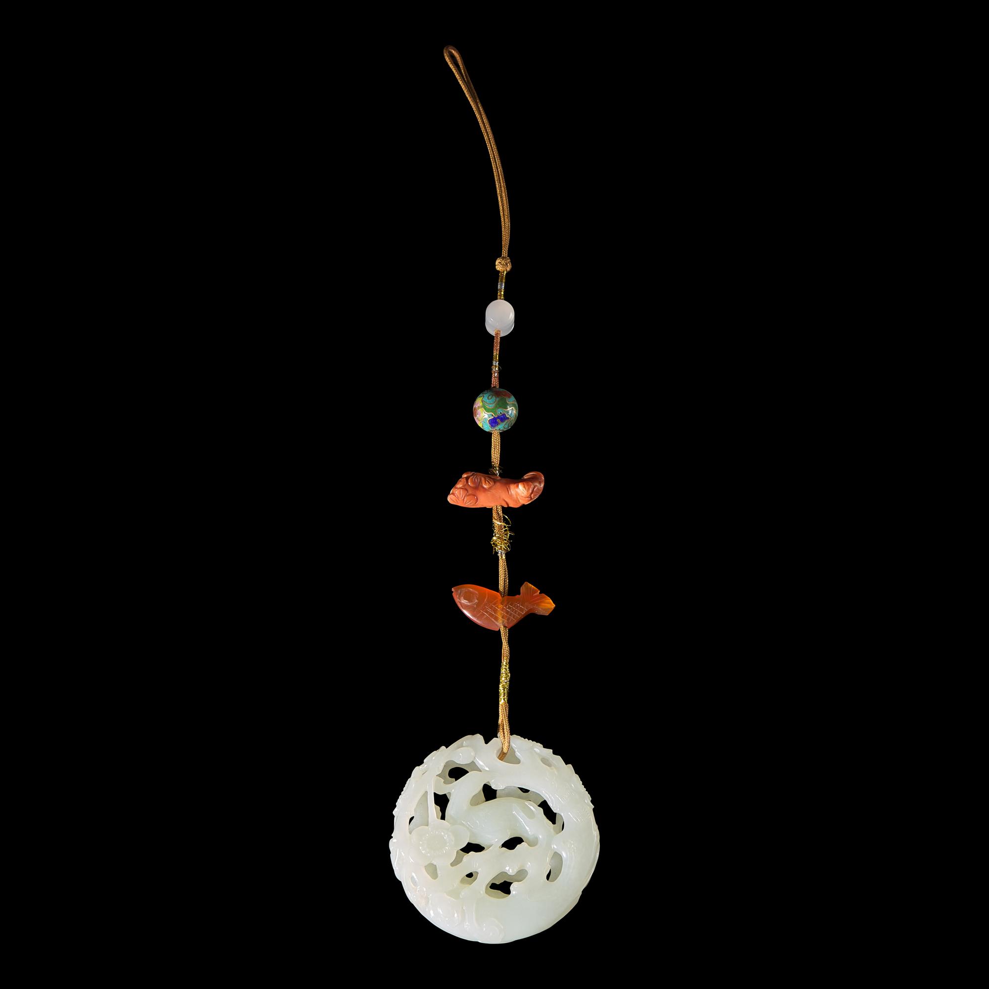 A Chinese White Jade Reticulated 'Phoenix' Pendant — 白玉鏤雕鳳鳥紋玉子岡佩