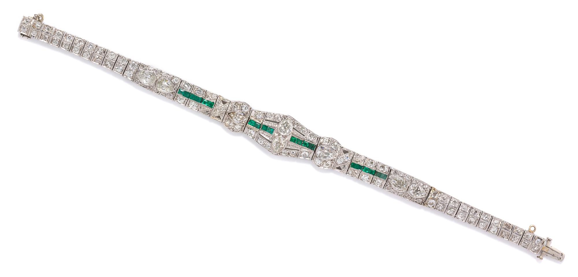 An Art Deco Platinum, Diamond and Emerald Bracelet, 14.00 dwts.