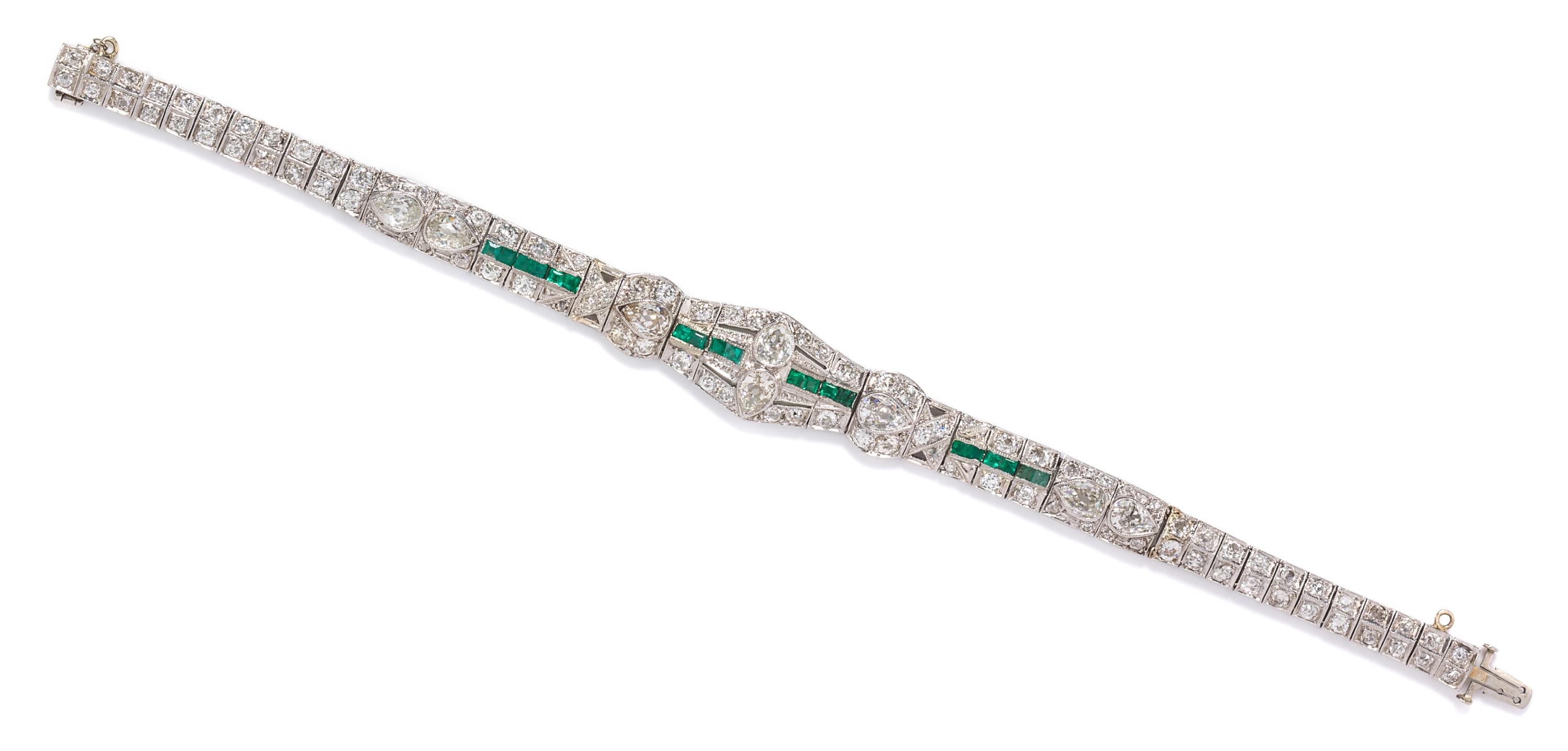 An Art Deco Platinum, Diamond and Emerald Bracelet, 14.00 dwts.