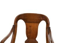 A Pair of Empire Style Mahogany Arm Chairs