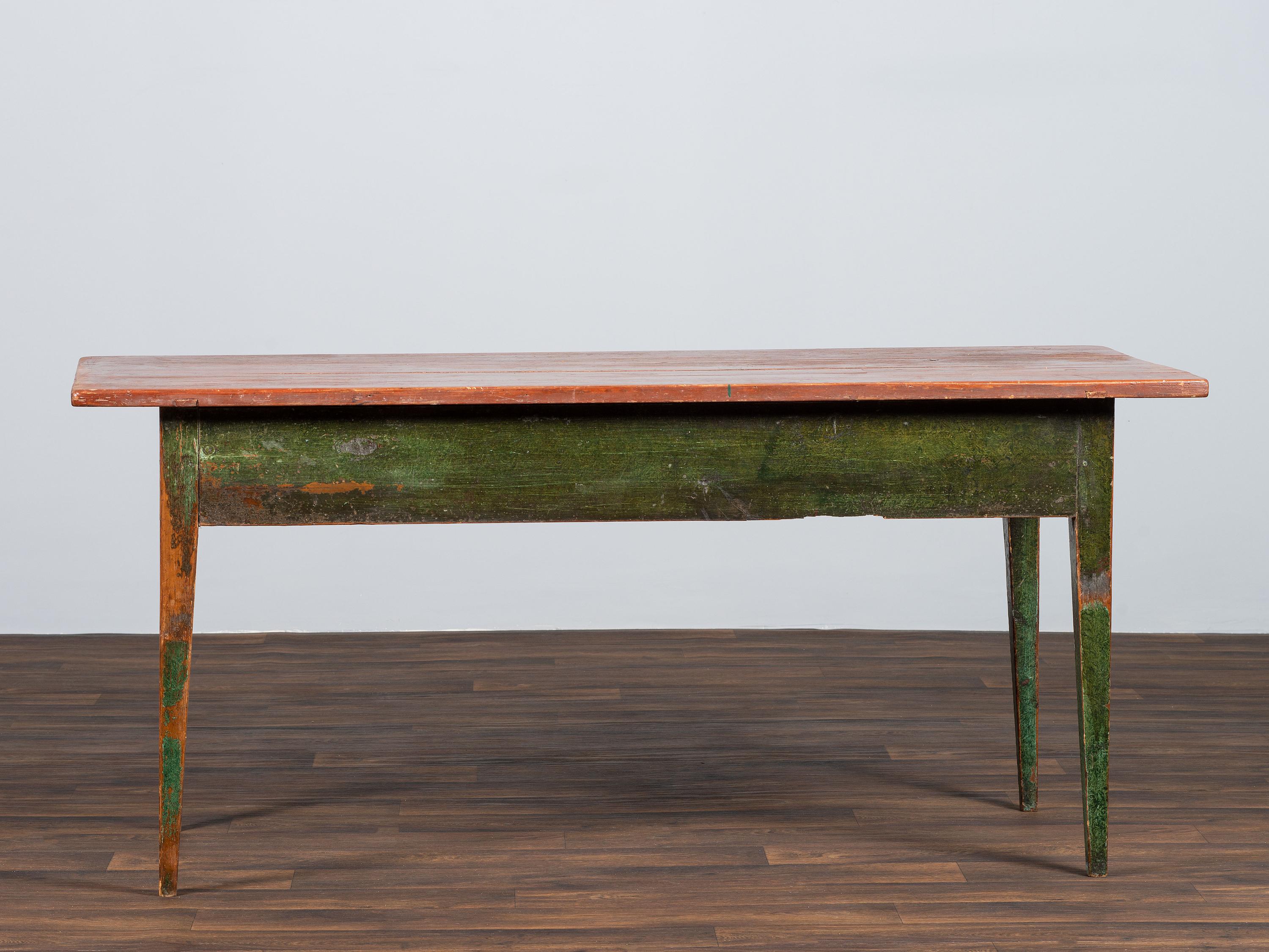 A Country Paint Decorated Pine Three-Drawer Farm Table