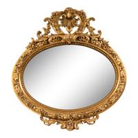 A French Giltwood and Composition Oval Mirror