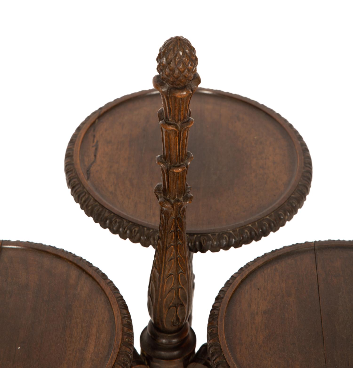 An Unusual English Carved Walnut Three-Part Stand