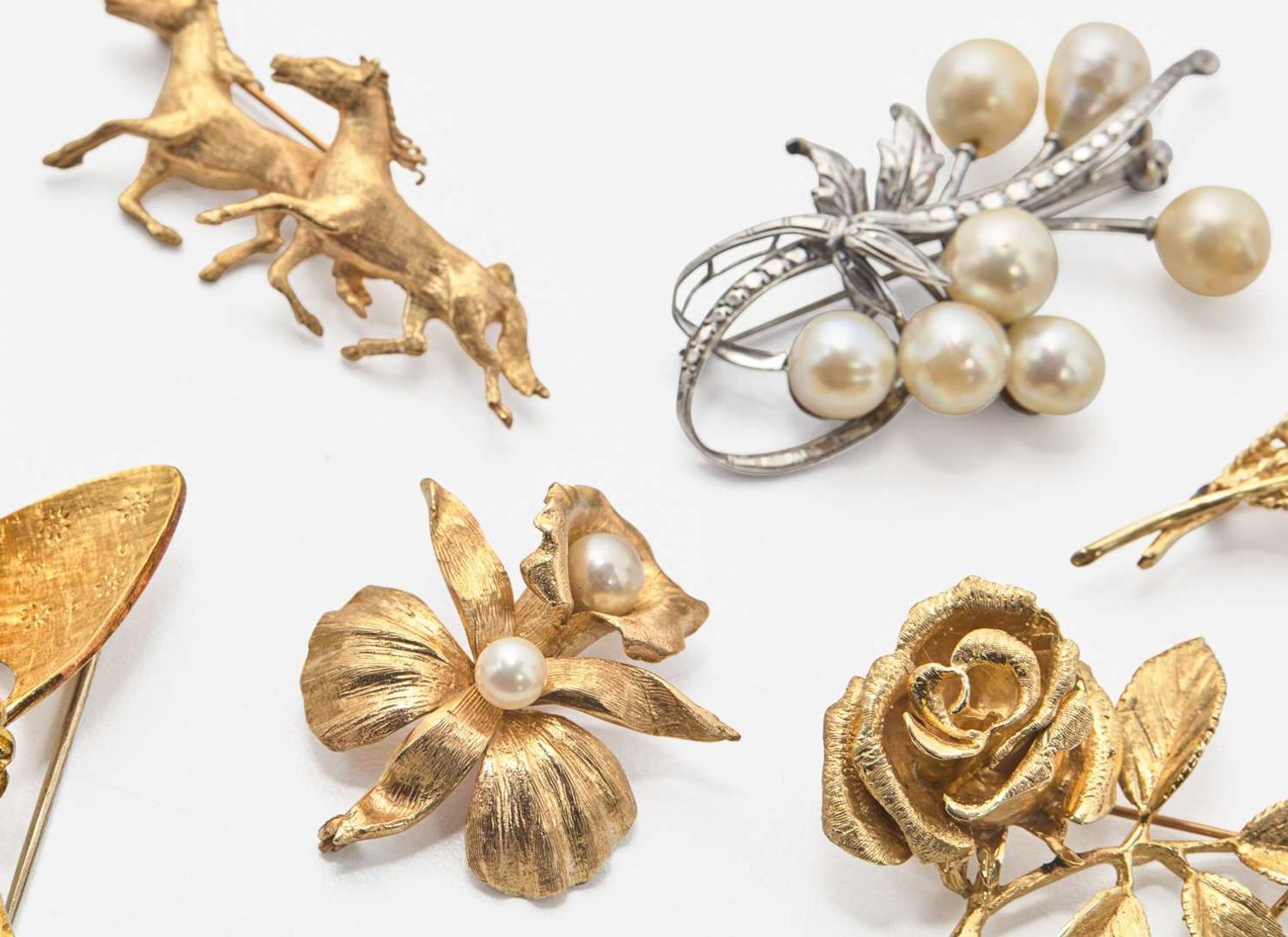 A Miscellaneous Collection of Gold Brooches