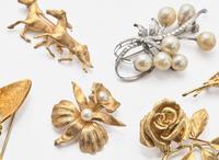 A Miscellaneous Collection of Gold Brooches