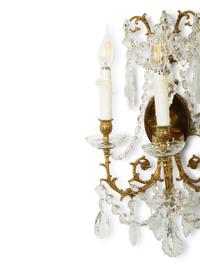 A Pair of Gilt Metal and Cut Glass Three-Light Wall Lights
