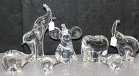 A Collection of Seven Studio Glass Elephant Figures Height of tallest 10 3/8 inches.