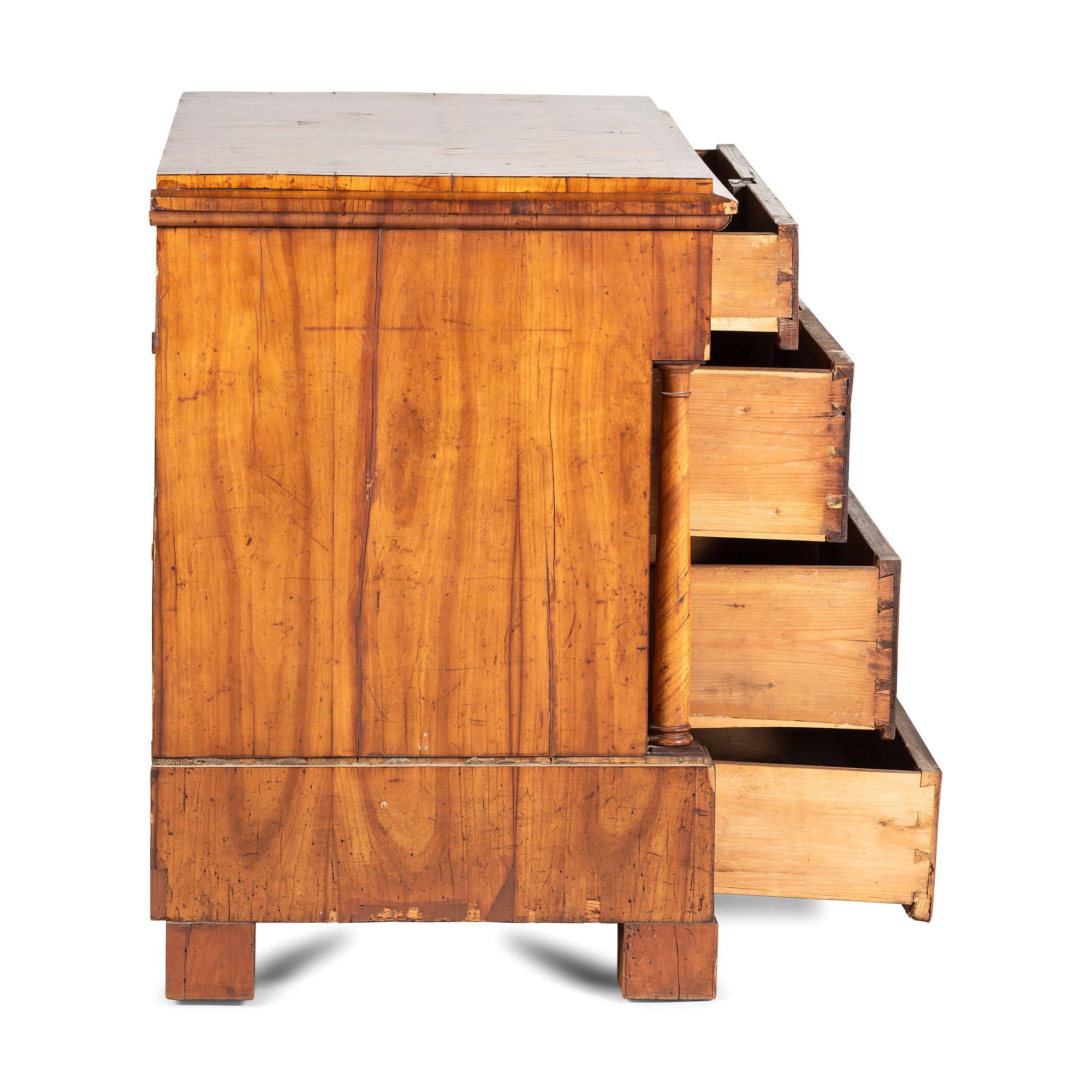 A Biedermeier Figured Walnut Chest of Drawers