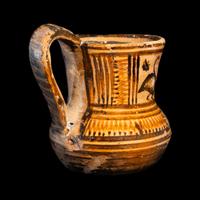 An Attic Pottery Tankard