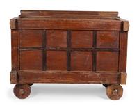 An Indian Carved Wood Traveling Trunk on Wheels — 19TH/20TH CENTURY