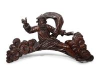 A Continental Carved Figural Ornament