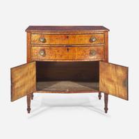 A Federal carved tiger maple bowfront dressing table together with tiger maple mirror early 19th century