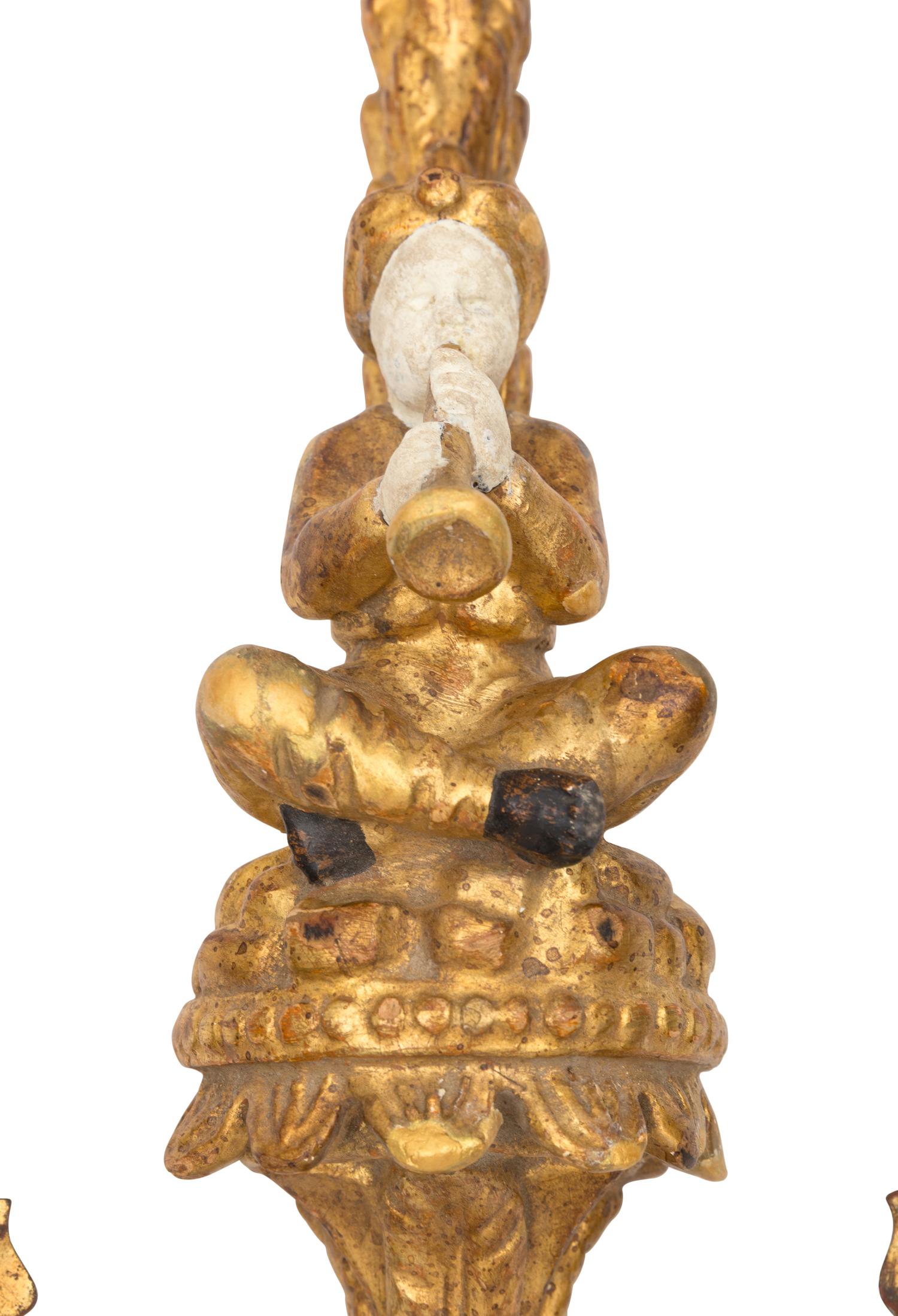A Pair of Italian Giltwood and Tole Figural Two-Light Sconces