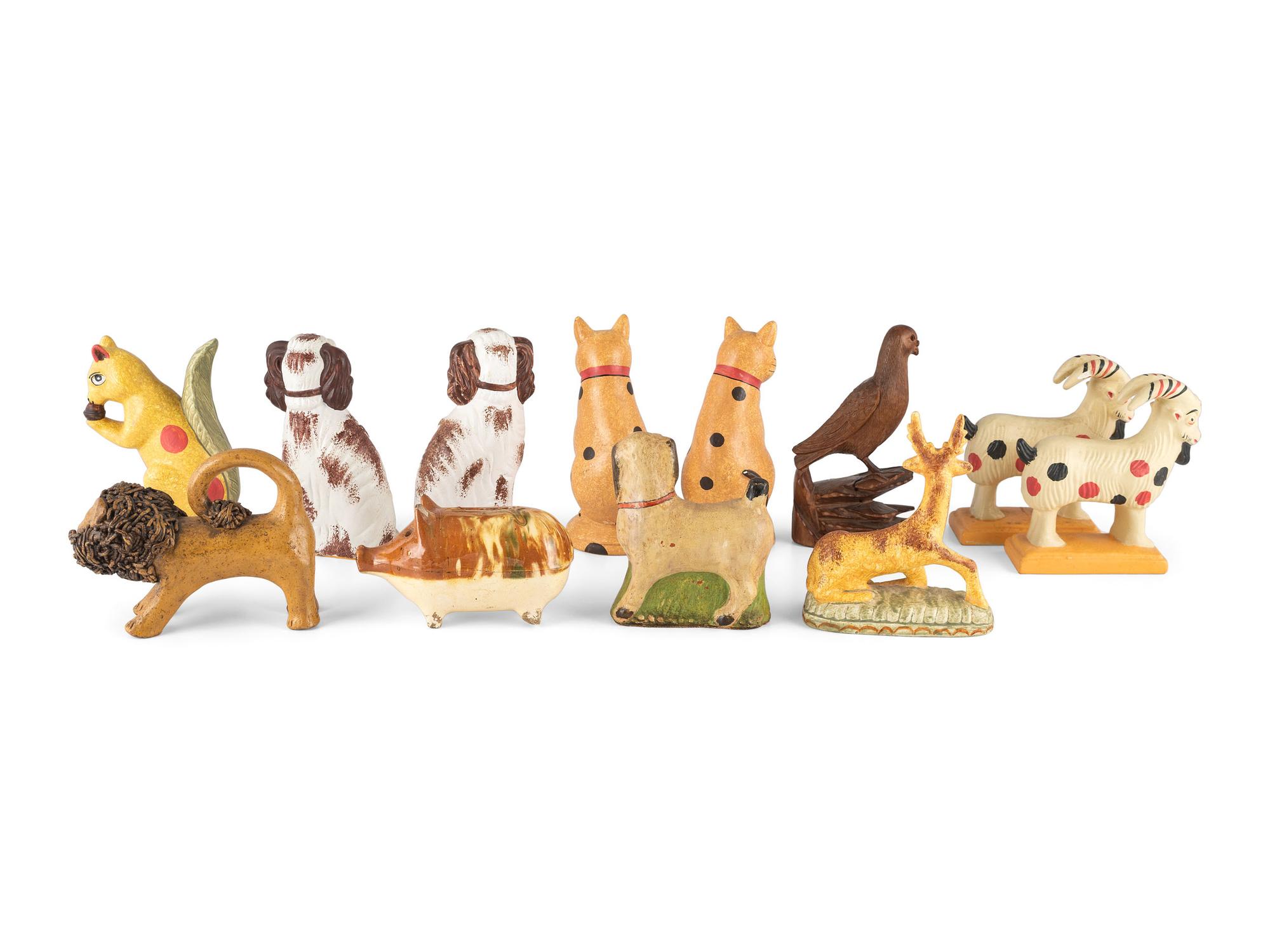 Twelve Contemporary Chalkware, Redware and Folk Carved Animal Figures