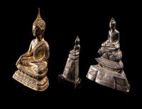 Three Thai Silver Veneered and Gilt Bronze Figures of Seated Buddha