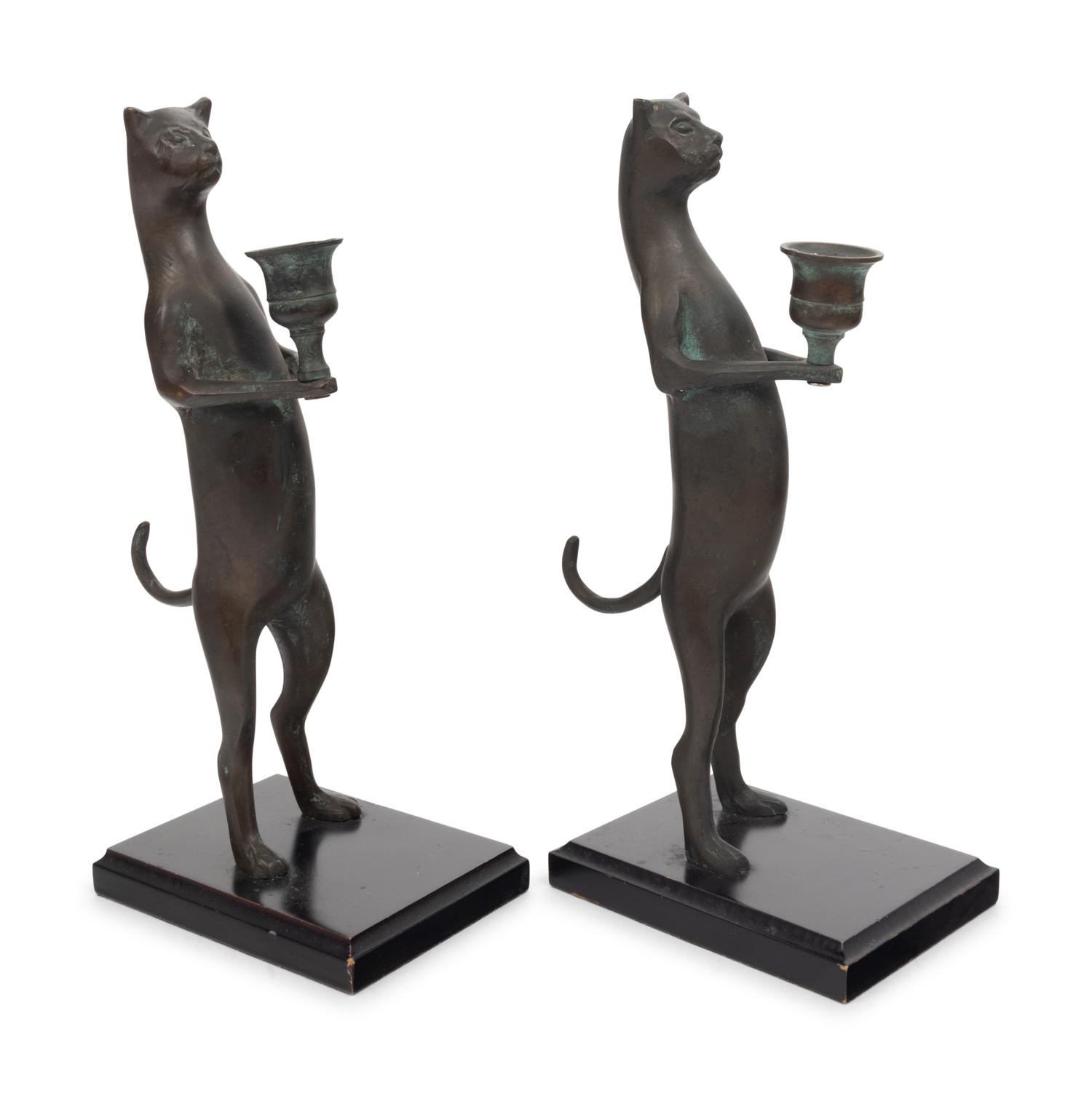 A Pair of Pewter Cat-Form Candlesticks