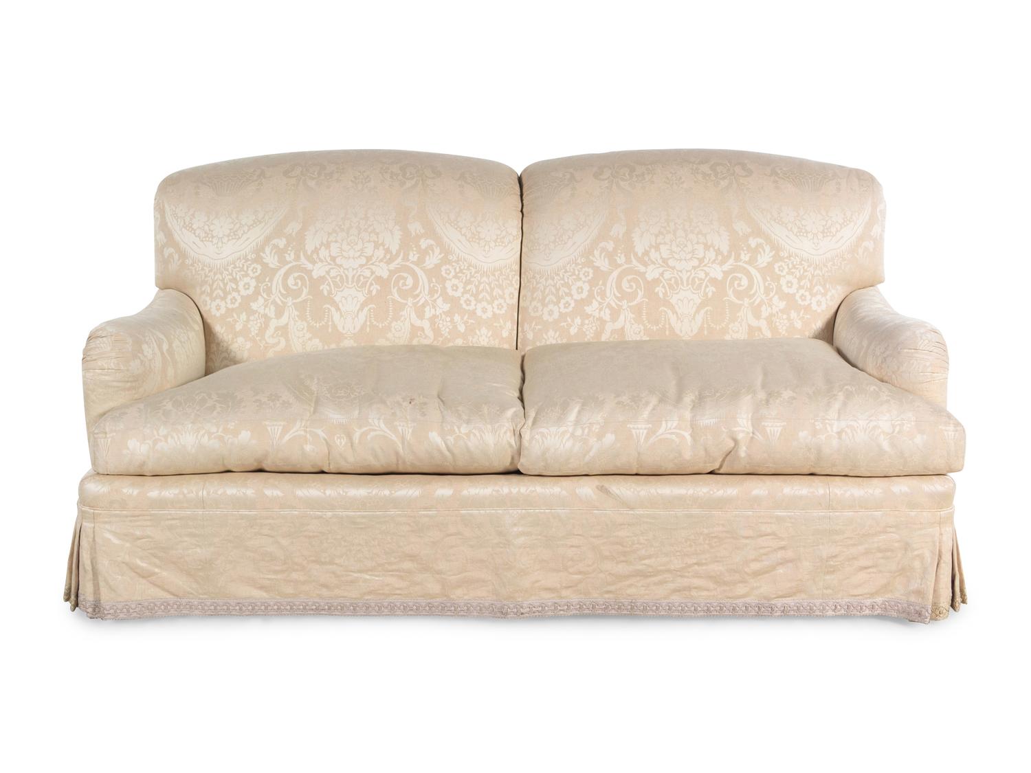 A Cream Damask Upholstered Two-Seat Sofa