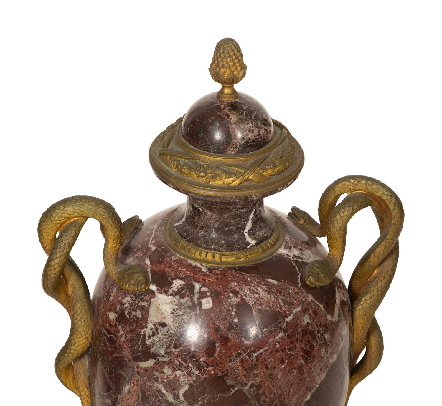 A Pair of Italian Gilt Bronze Mounted Rosso Levanto Marble Urns with Snake Handles