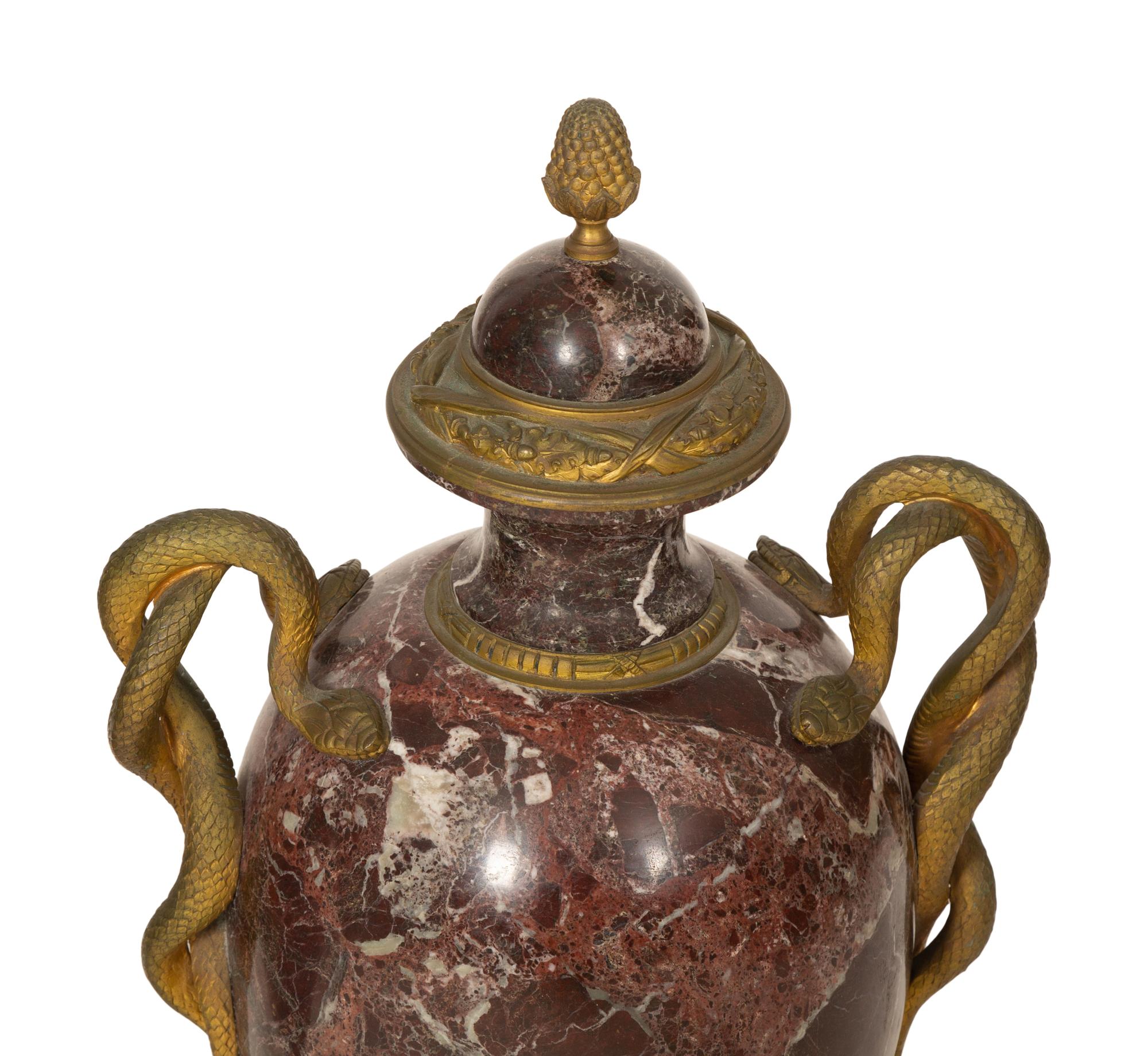 A Pair of Italian Gilt Bronze Mounted Rosso Levanto Marble Urns with Snake Handles