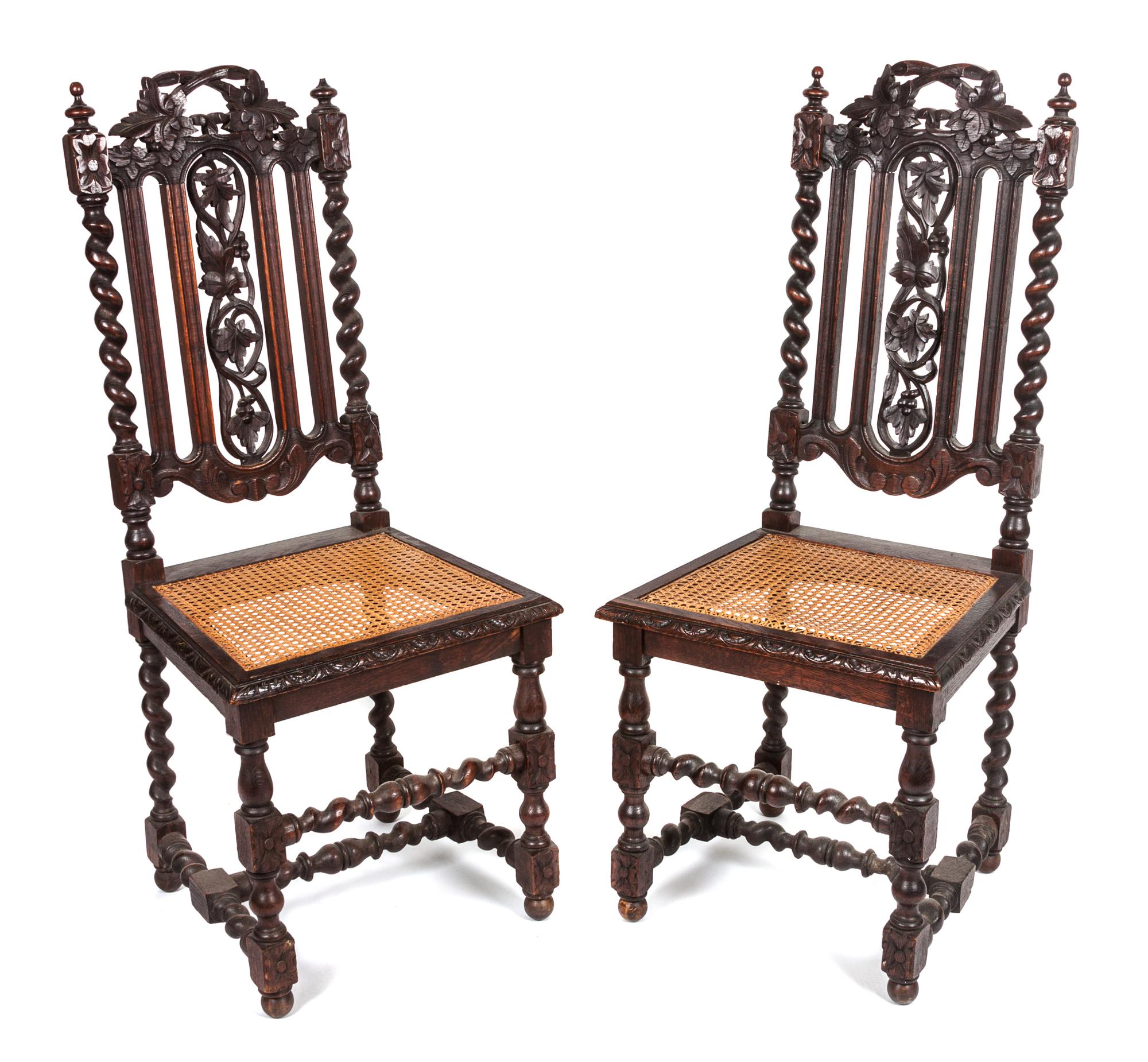A Pair of Renaissance Revival Carved Oak Side Chairs Height 41 inches.