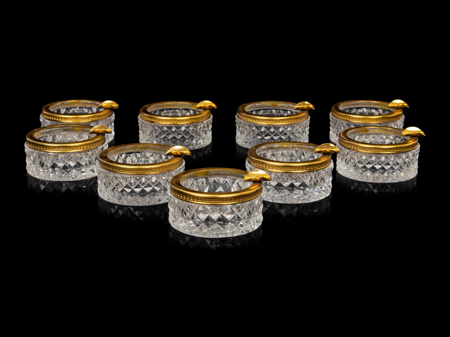 A Set of Nine Small Cut Glass Ash Trays
