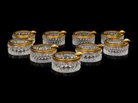 A Set of Nine Small Cut Glass Ash Trays