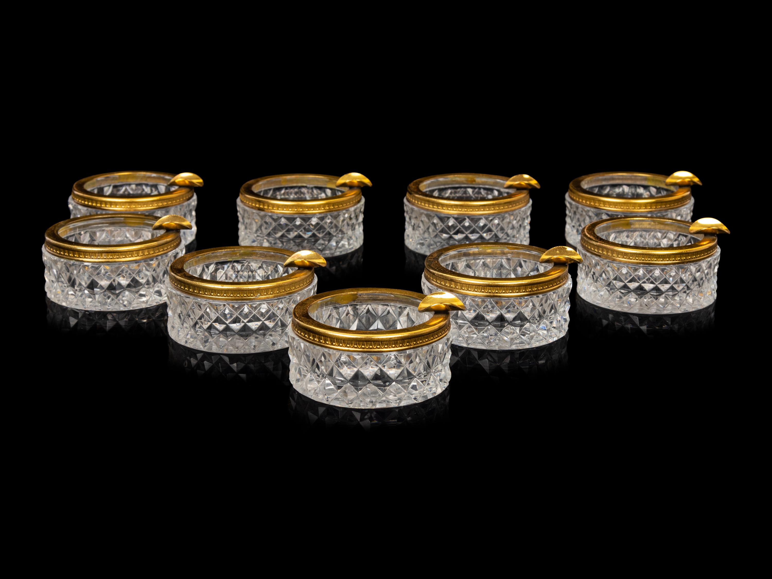 A Set of Nine Small Cut Glass Ash Trays