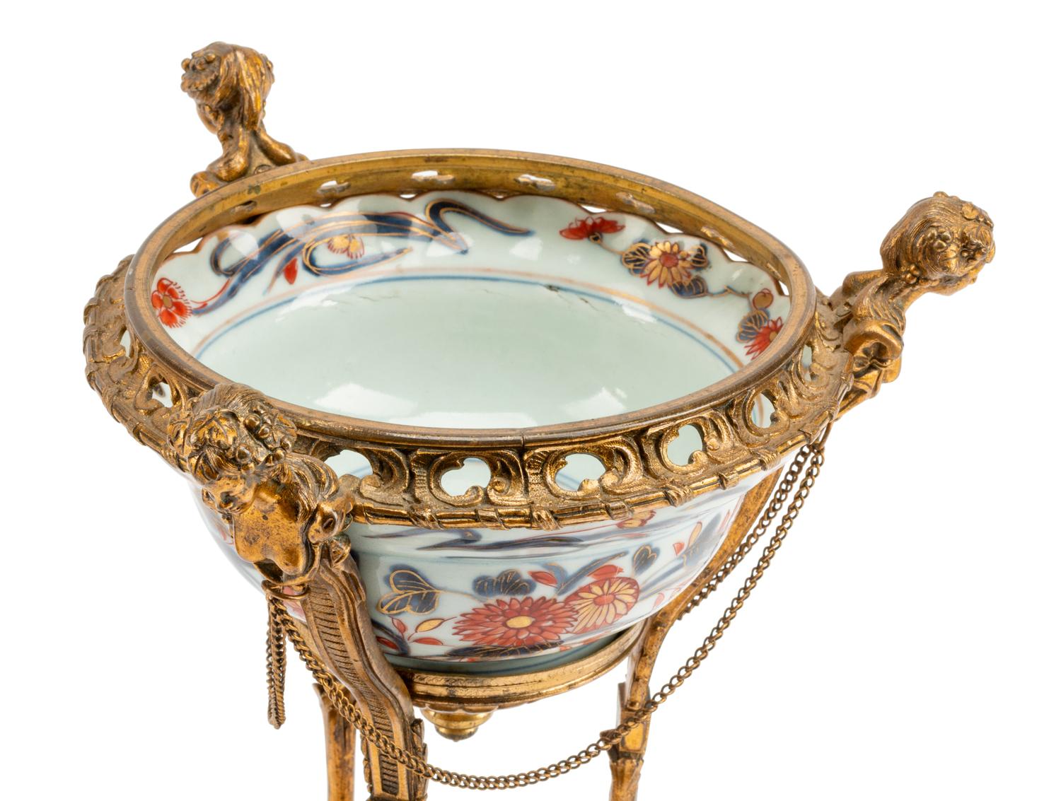A Pair of French Gilt Bronze Mounted Chinese Porcelain Coupes
