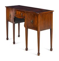 A Regency Figured Mahogany Serpentine-Top Sideboard