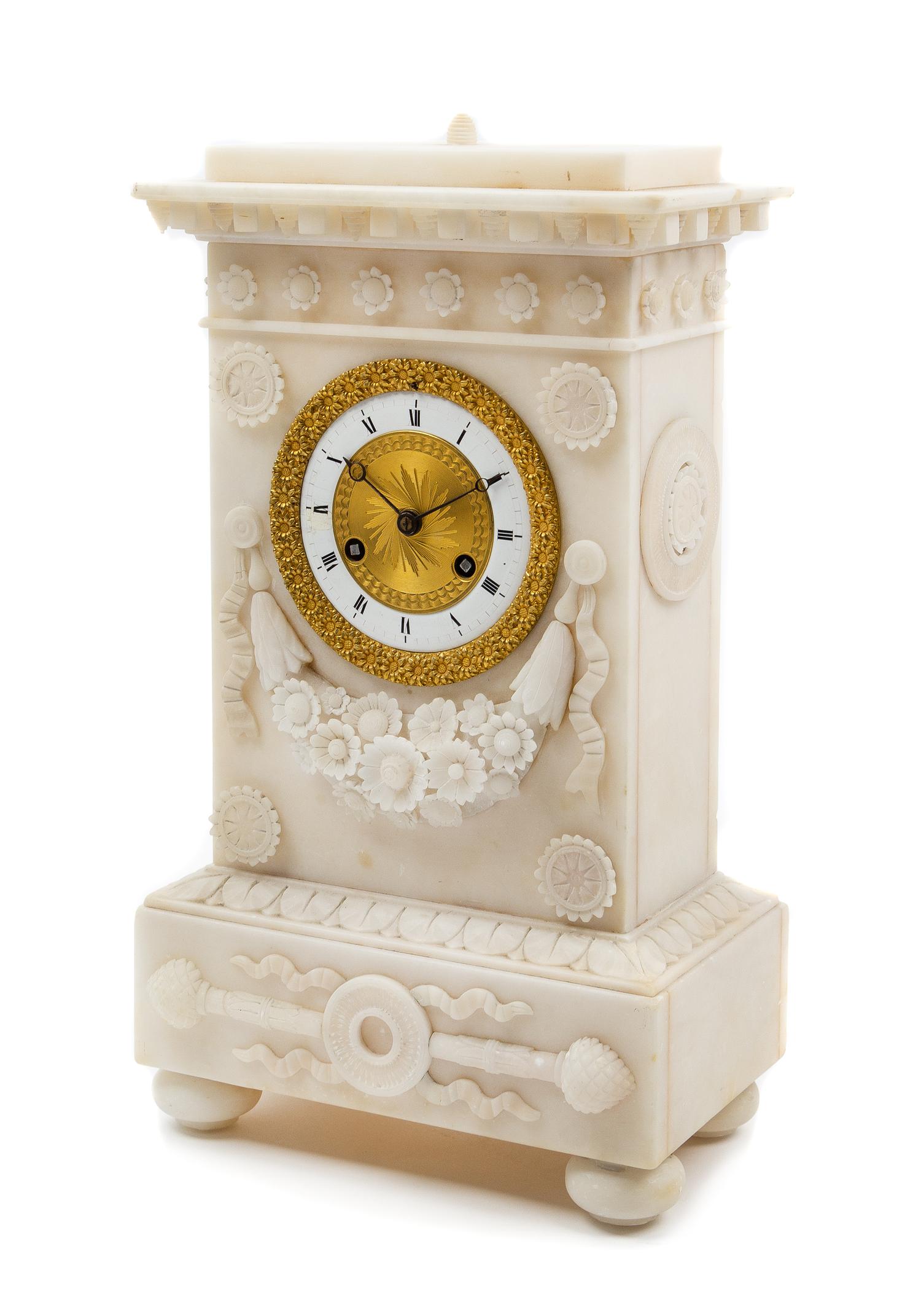 A Charles X Carved Alabaster Mantel Clock Height 13 3/4 x width 7 3/4 x depth 4 1/2 inches. — CIRCA 1830