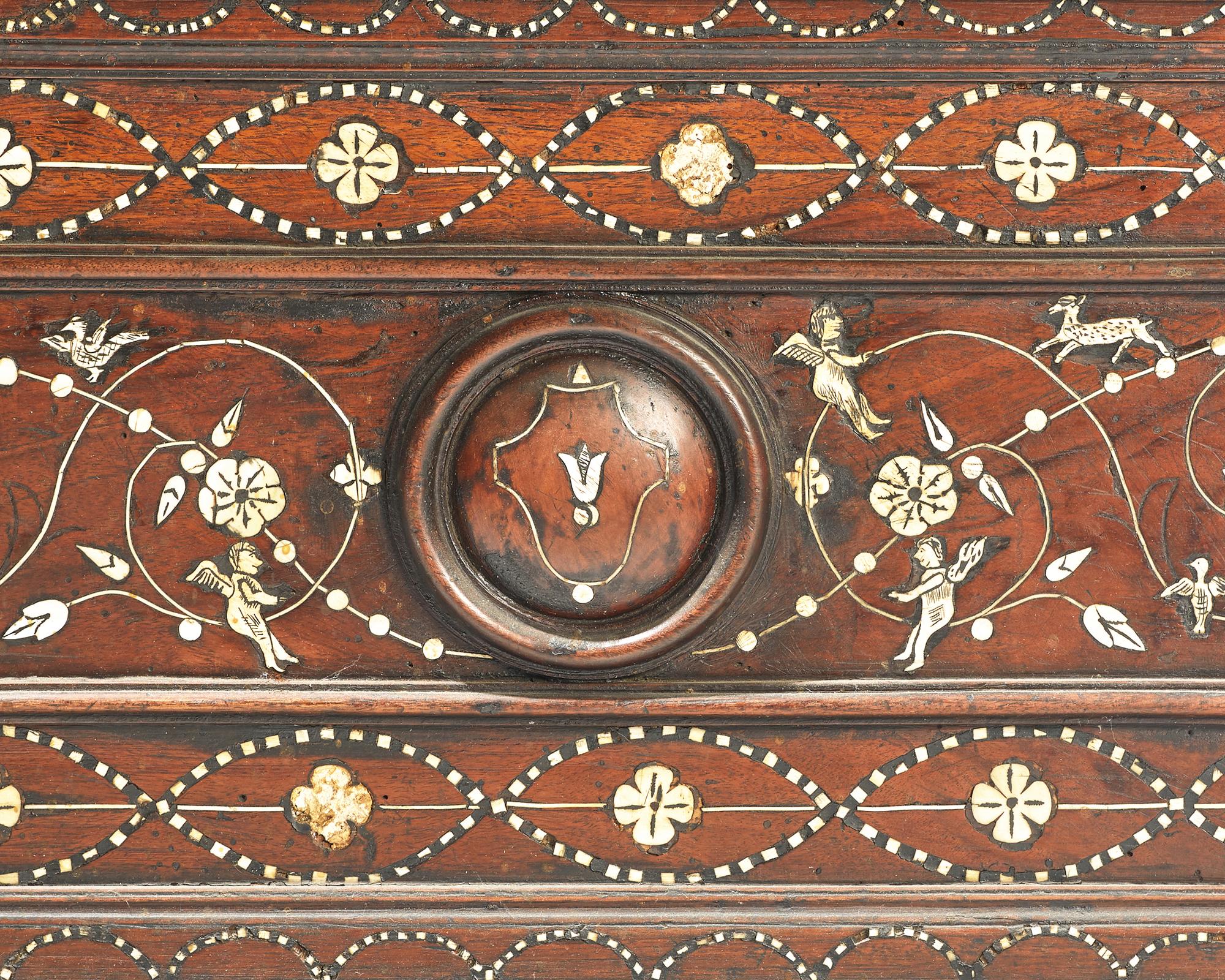 An Italian Baroque bone-inlaid walnut cassone, 17th century