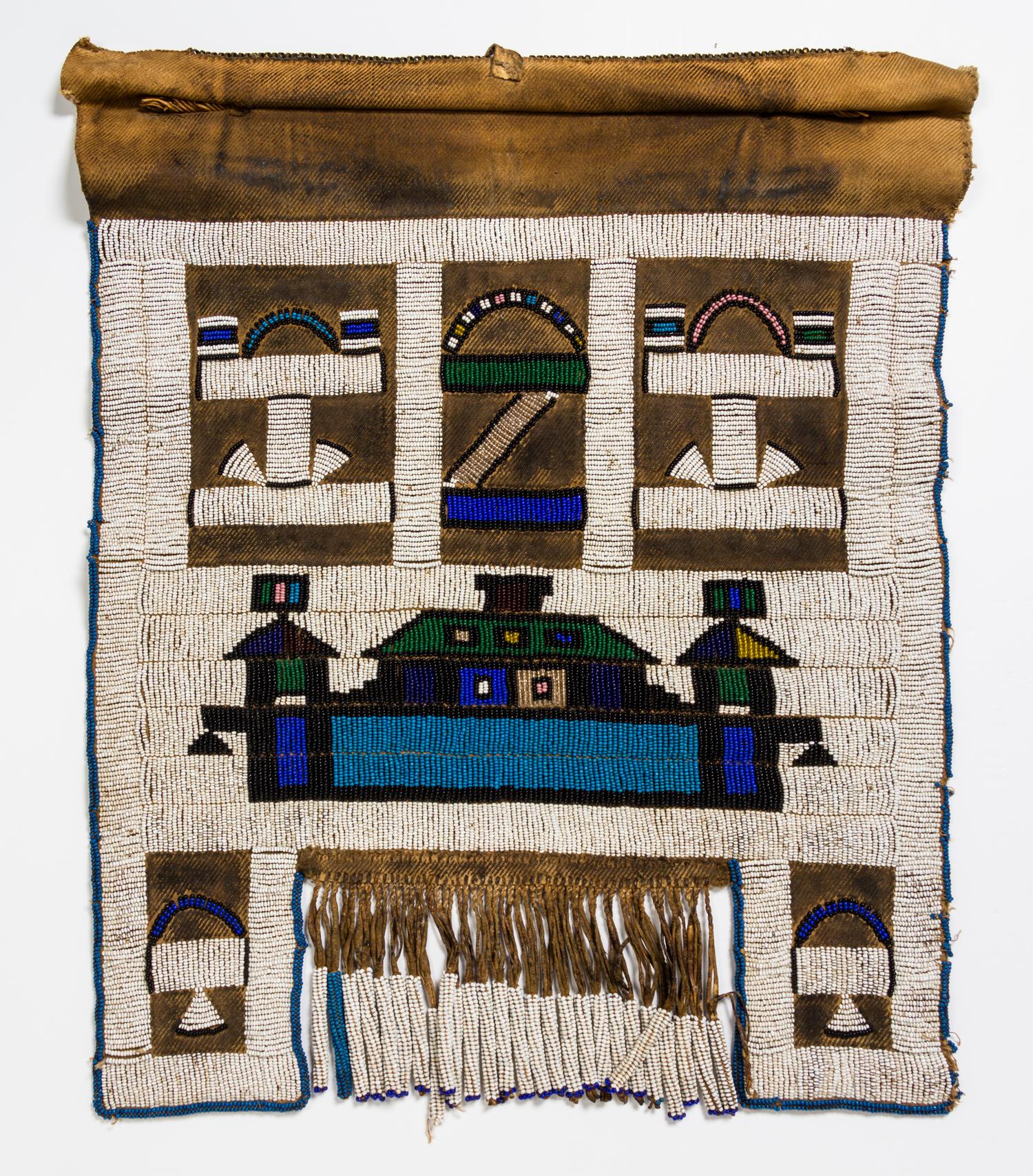 A Group of Four African Beaded Aprons Height of largest 21 1/2 x width 20 1/4 inches.