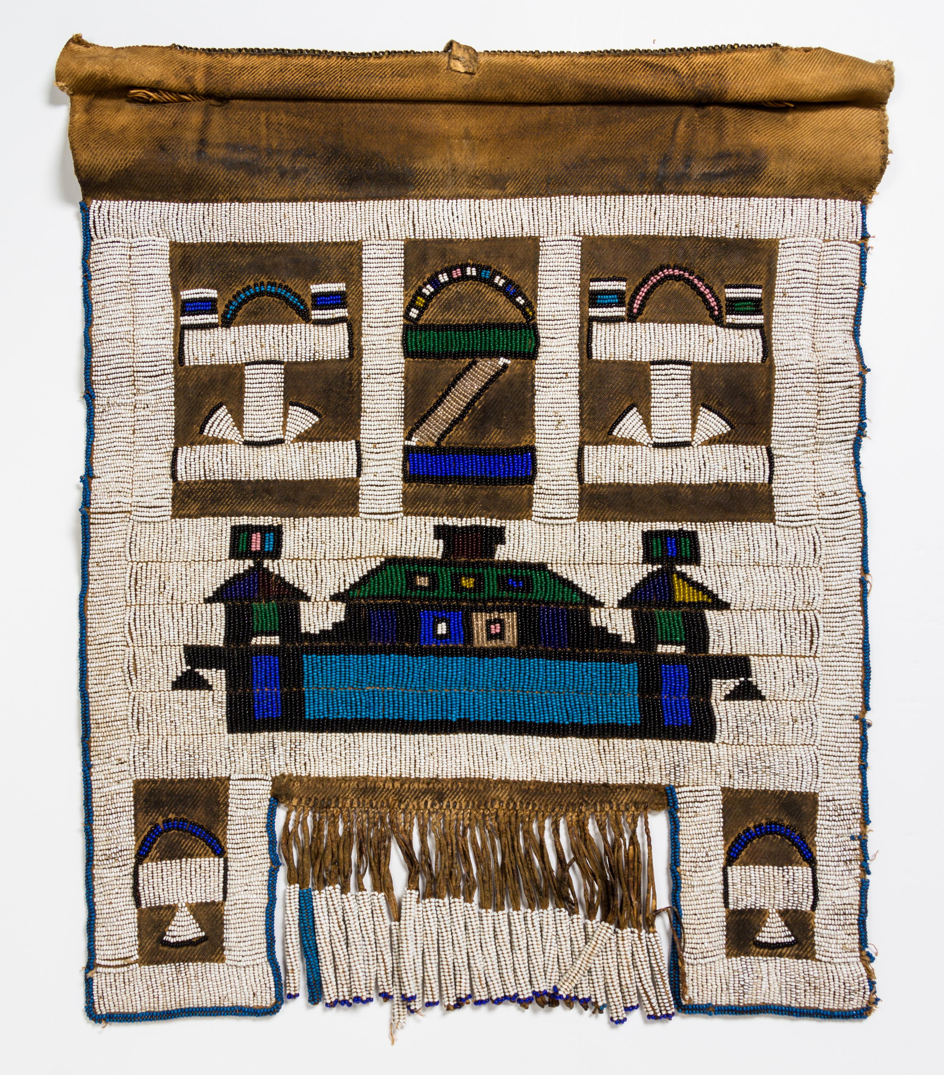 A Group of Four African Beaded Aprons Height of largest 21 1/2 x width 20 1/4 inches.