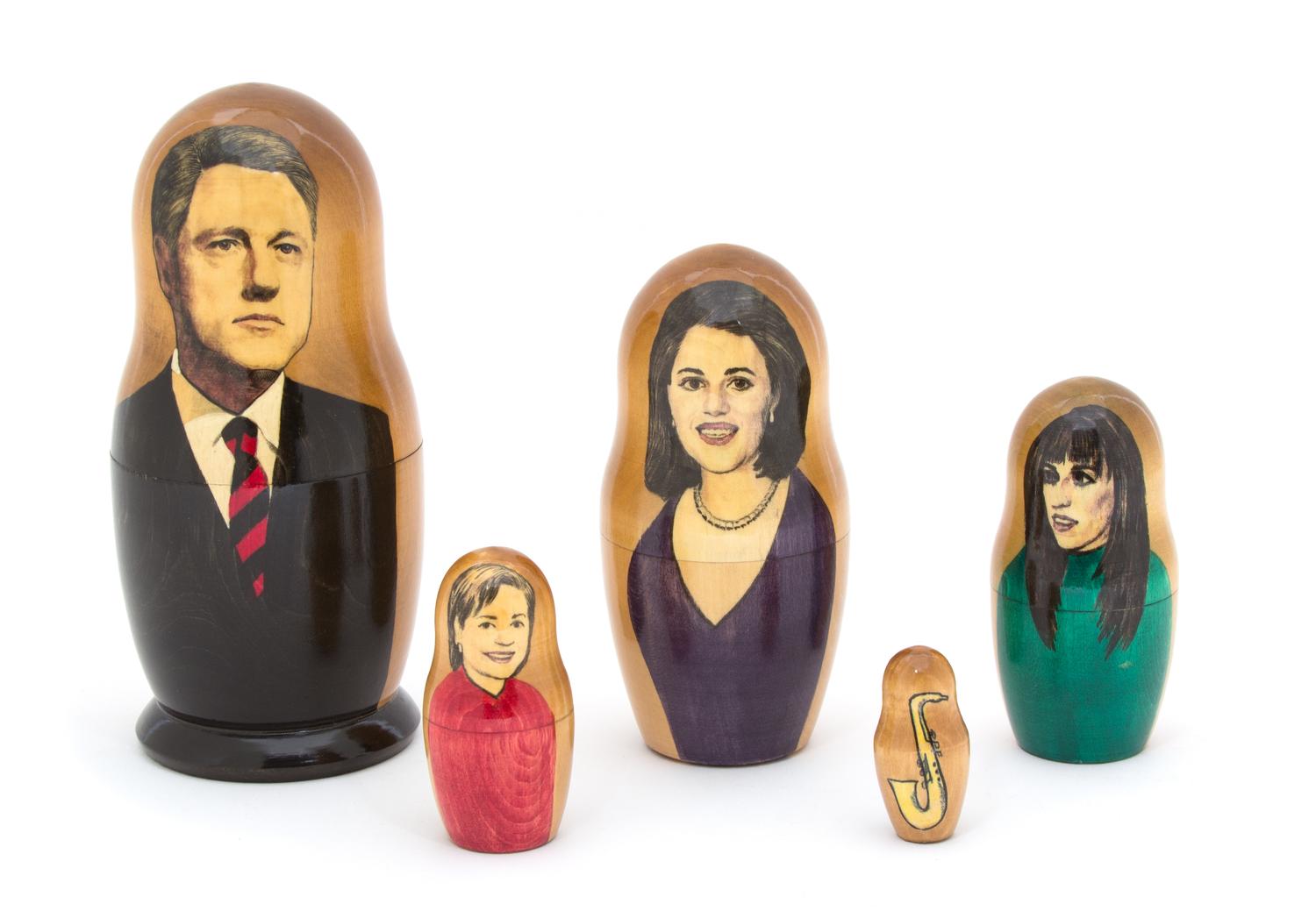 A Collection of Three Russian Bill Clinton Nesting Dolls Height of tallest 10 1/2 inches. — 20TH CENTURY