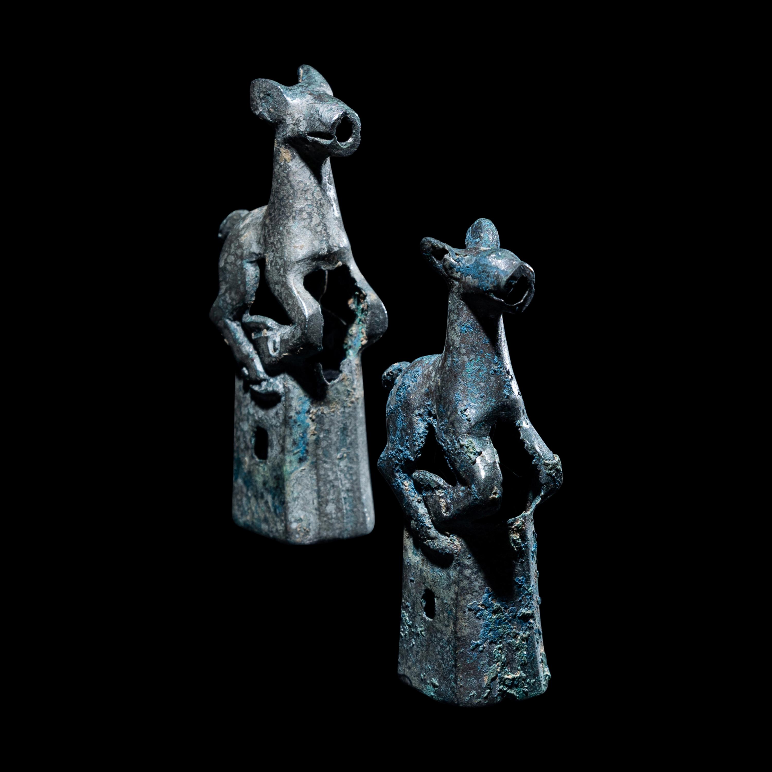 Two Eurasian Tinned Bronze Finials with Frolicking Does