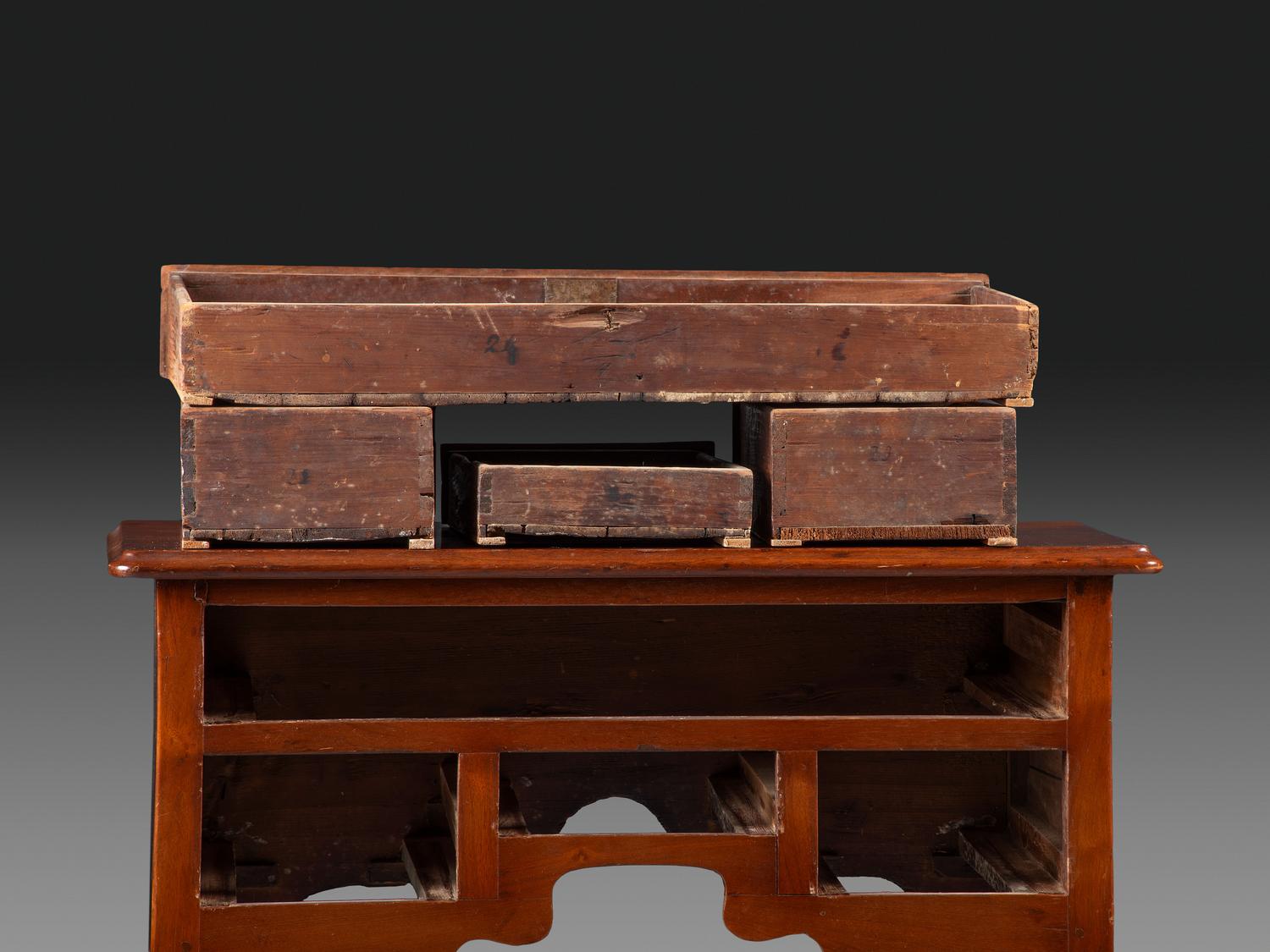 A Queen Anne Carved and Figured Walnut Dressing Table