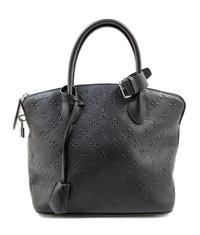 A Louis Vuitton Black Empreinte Montaigne Handbag, 11" x 10.5" x 6"; Handle drop: 4.5".