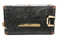 A Black Metal Steamer Trunk Height 12 1/2 inches x width 36 inches x depth 21 7/8 inches.