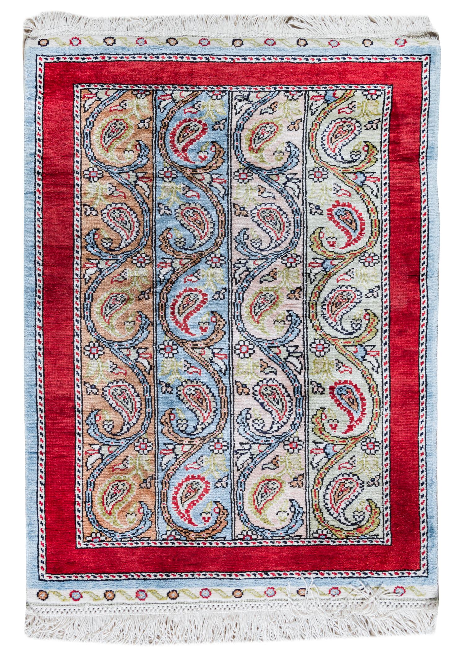 A Persian Silk Prayer Rug 2 feet 3 inches x 1 foot 7 1/4 inches. — 20TH CENTURY