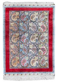 A Persian Silk Prayer Rug 2 feet 3 inches x 1 foot 7 1/4 inches. — 20TH CENTURY
