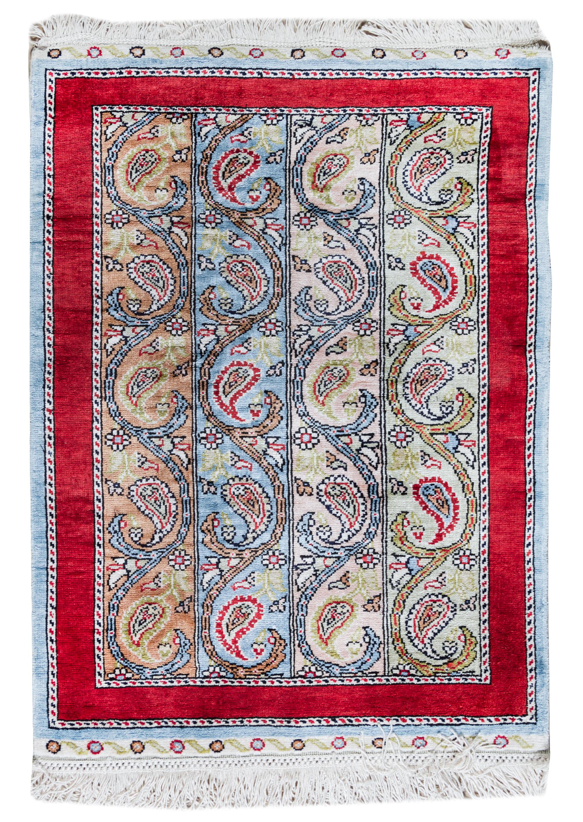 A Persian Silk Prayer Rug 2 feet 3 inches x 1 foot 7 1/4 inches. — 20TH CENTURY